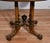 Description: This exceptional oval center table showcases refined Neoclassical design with striking craftsmanship and...