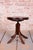 Highest height: 51 cm (20.1 in) Lowest height: 42 cm (16.5 in) Seat diameter: 42 cm (16.5 in) This piano stool is an...