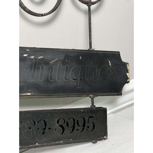 Black Large Antique Wrought Iron Bracket With Two-Tier Wooden Sign, "Inn & Antiques" For Sale - Image 8 of 10