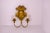 Neoclassical carved-wood sconce with a face of a woman and a bow. Celadon green with gilded accents, the piece has a very...