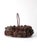 This vintage handmade pinecone basket brings together rustic woodland texture and sculptural form in a richly layered...