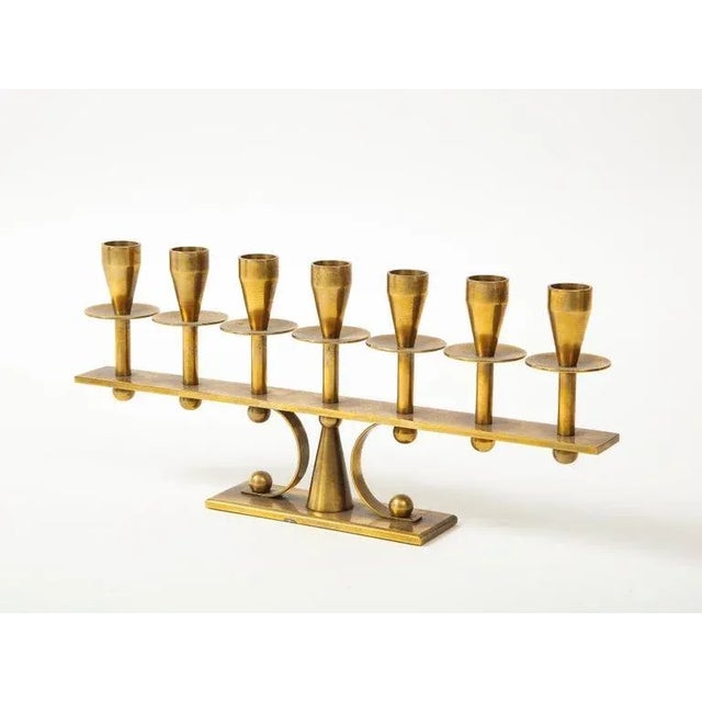 Stunning 1960s solid brass Danish candelabra. It fits two difference size candles.