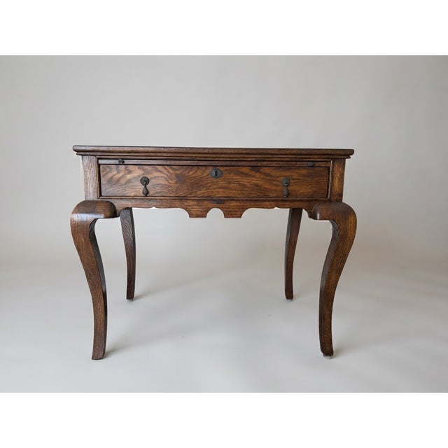 A vintage Minton-Spidell "Dutch Tea Table", with the maker's label ("Minton-Spidell, Custom Furniture, Los Angeles")...