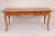 Louis XV style fruit wood writing / dining table, made from 19th century and later elements. With a 4 board rectangular...