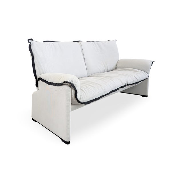 We are offering a beautiful designer two-seater sofa from the renowned Italian manufacturer Cassina for sale. Designed by...