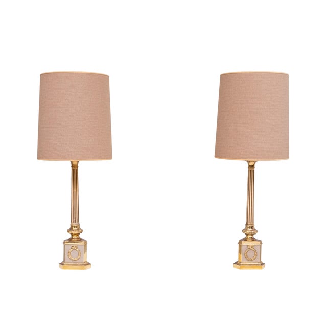 Very nice pair of Empire column Table lamps on a brass base. Comes with their original beautiful shades. Gold inside....