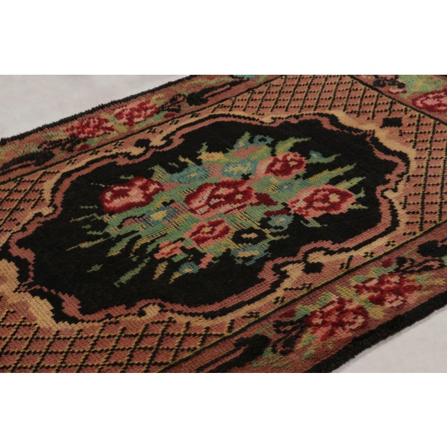 Hand-knotted in wool and originating from Turkey circa 1950-1960, this 4x7 vintage Tulu rug is a rich new piece and the...