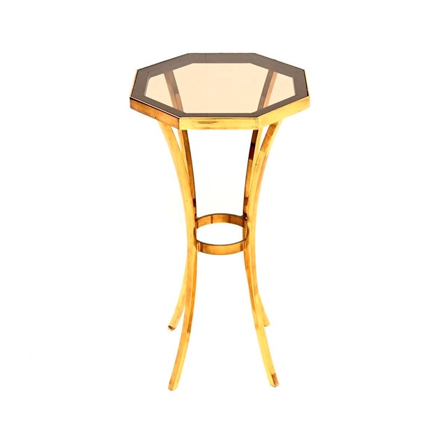A stylish and extremely well made vintage French brass side table, dating from the 1960-70’s. This is of superb quality...
