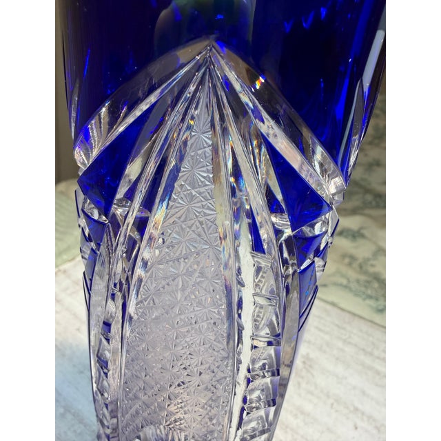 This stunning, vintage vase is in excellent condition. The light plays off the cut crystal even in low lighting. I found...