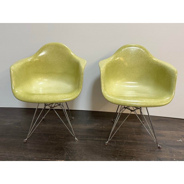 Design Plus Gallery presents a pair of Modernica Case Study Fiberglass Arm Shell Chairs. This set includes molded...