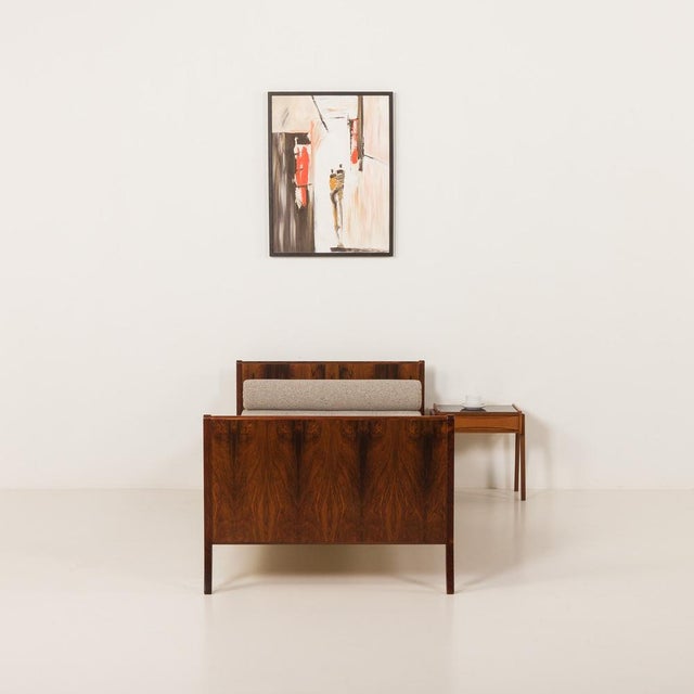 The mid-century rosewood daybed designed by andreas jeppe iversen and made in denmark in the 1960s is a splendid example...