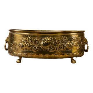 Vintage Brass Footed Planter with Floral Lion Handles For Sale