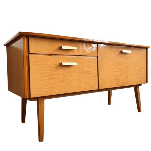 Beautiful original Mid-Century Modern sideboard (lowboard) from the 1950s/60s with a stylish, minimalist design. This...