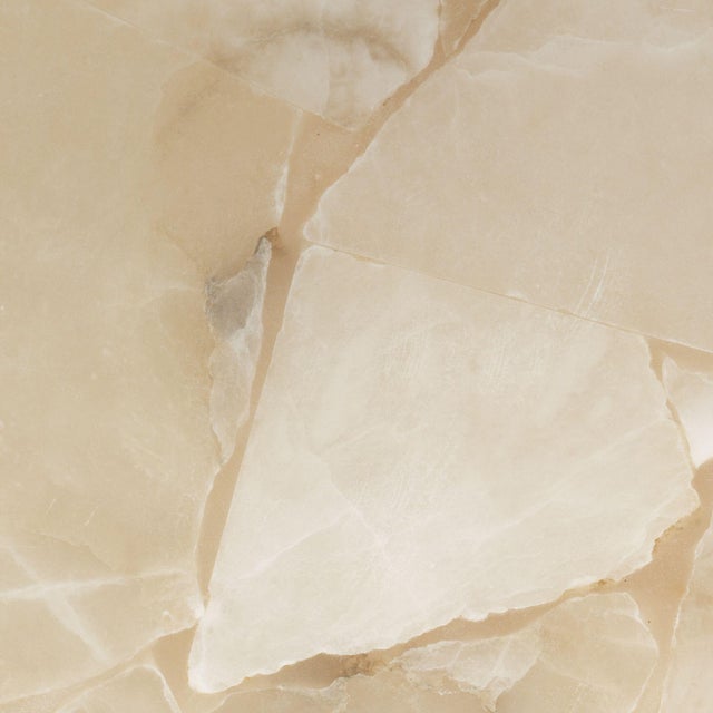 The Alabaster Borealis lamp has the cool luminosity of an Arctic evening. With its organic cut pieces, this hand-made lamp...