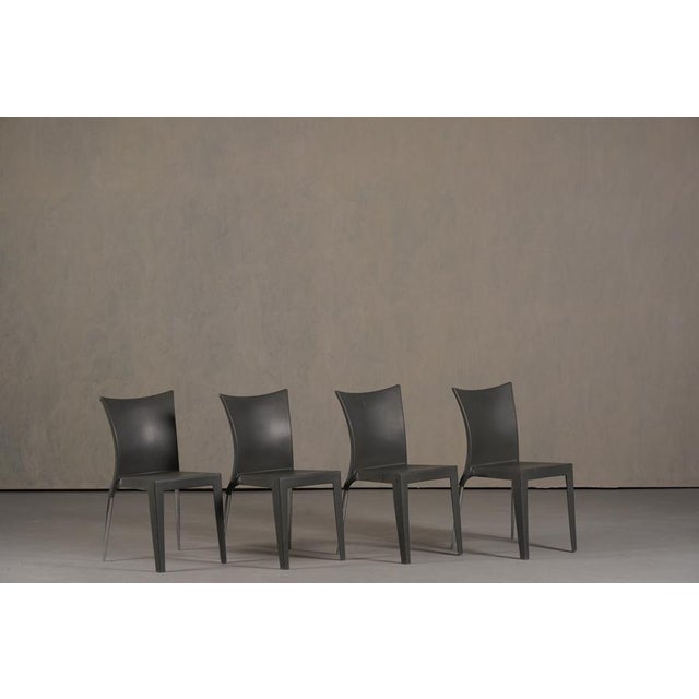 A contemporary 2000s chair set designed by Robbi Cantarutti and Claudio Biferali for Arrmet, the Jo chair combines...