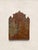 An antique cast iron fireback bearing the inscription “PAX,” the Latin word for peace, and the cast date 1679. The relief...