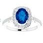 14k White gold ring with 1.04 carat sapphire and 42 round brilliant diamonds wighing 0.45 carats. 3.27 grams size 7