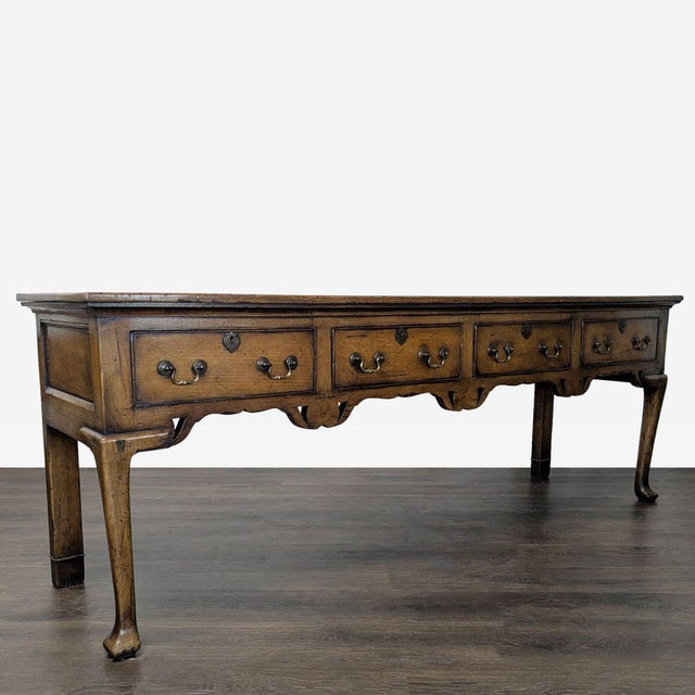 Georgian style rustic table with metal embellishments. Dimensions (in): 84W x 22D x 30H.