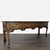 Georgian style rustic table with metal embellishments. Dimensions (in): 84W x 22D x 30H.