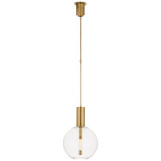 Kelly Wearstler for Visual Comfort Signature Nye Globe Pendant in Antique-Burnished Brass with Clear Glass For Sale