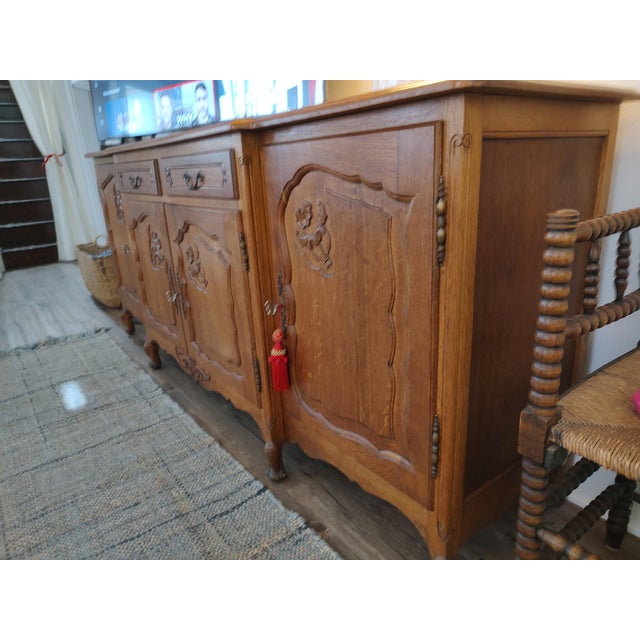 Antique French Rococo Sideboard - Oak French Provincial or Louis XV-style carved wooden sideboard or buffet cabinet,...