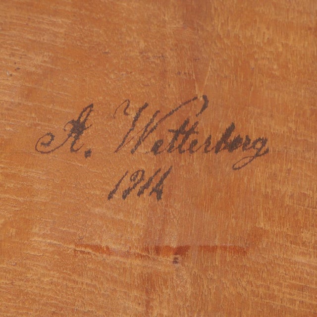 A pair of twin mirrors from 1914 by Spiegelmeister Wetterberg. The pieces are signed and given the year. It is gold-plated...