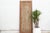 Bold yet ethereal, this lattice Portal door is a masterclass in architectural transparency. Reconstructed from authentic...