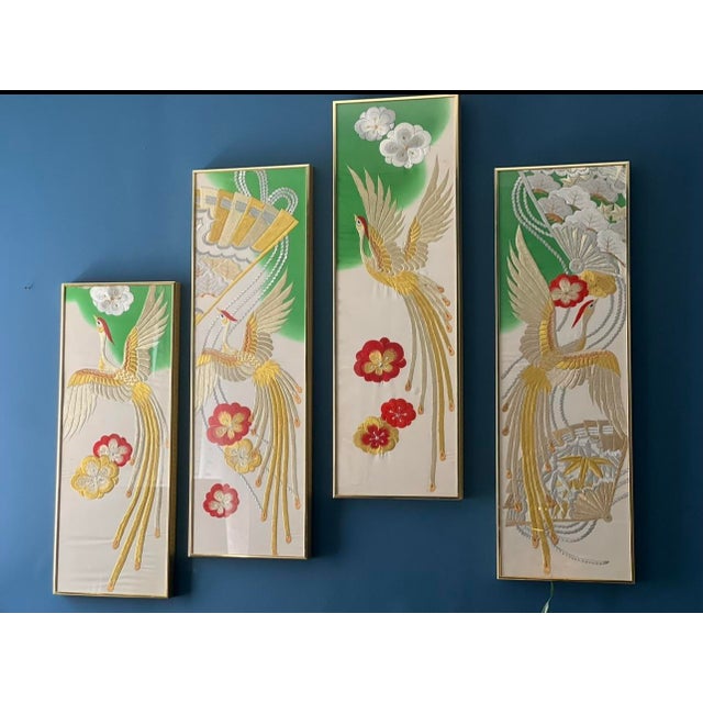 An exceptional four-panel wall composition crafted from vintage Japanese kimono silk, exquisitely embroidered with golden...