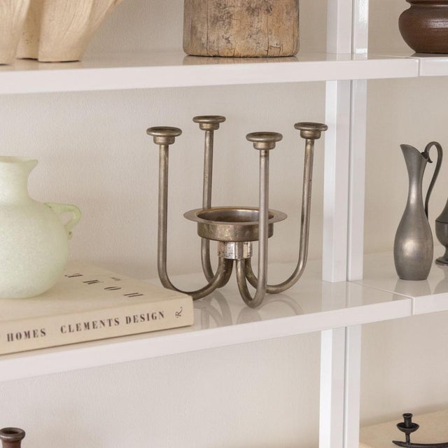 Incredible silver plate sculptural four arm candelabra from France, 1940s. Four curved silver arms with center surface for...