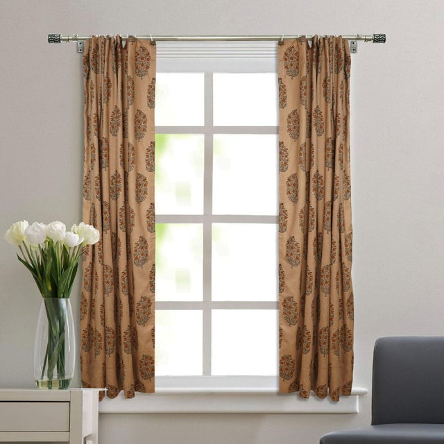 Enhance your home with the timeless elegance of this block print ring curtain, crafted from soft, breathable viscose...