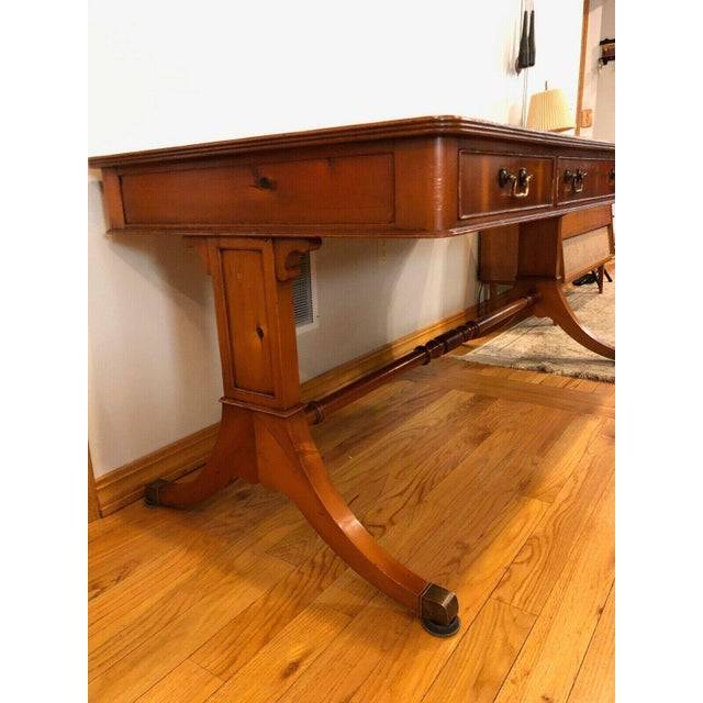 Elegant Alfonso Marina Regency Writing Desk crafted in richly figured yew wood with a hand-tooled green leather writing...