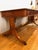 Elegant Alfonso Marina Regency Writing Desk crafted in richly figured yew wood with a hand-tooled green leather writing...