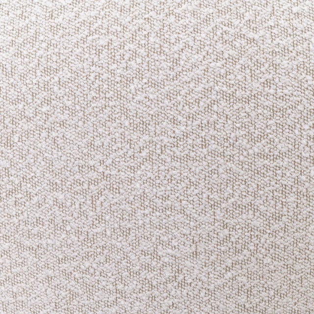 A pair of wooden upholstered armchairs created in 20th century United Kingdom. With a wide base and gracefully splayed...