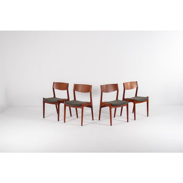 Lovely set of four Danish dining chairs made by Sorø Stolefabrik. Crafted from teak, these chairs feature a warm, rich...