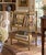 A charming circa-1960s Canterbury book stand with a beautifully aged painted finish, faux-bamboo detailing, and delicate...