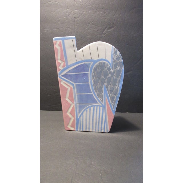This is an AWESOME VINTAGE handmade pottery vase from Eric & Chuy Boos from 1987. The vase has a very abstract shape that...