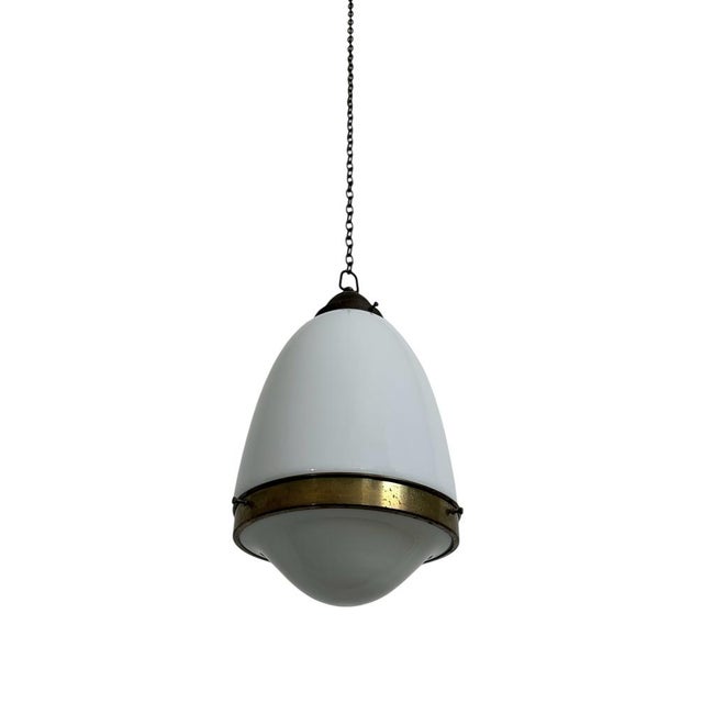 - An original and rare Bauhaus opaline brass ceiling pendant, Germany circa 1930. - The pendant consists of an opaline...