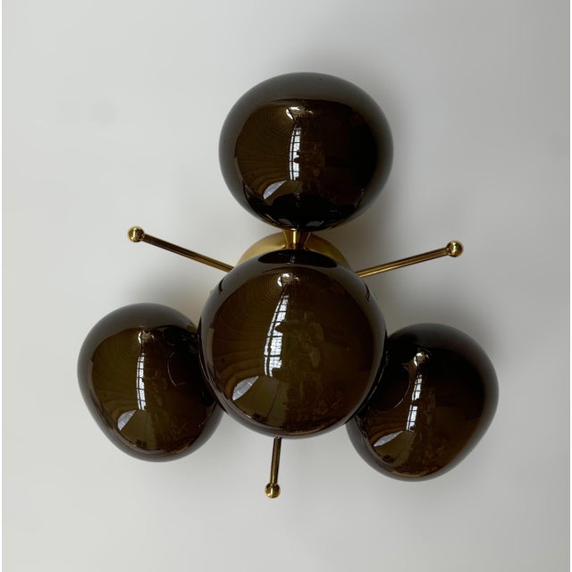 Italian flush mount with 4 frosted smoky pebble shaped Murano glass shades mounted on solid brass frame in lacquered...