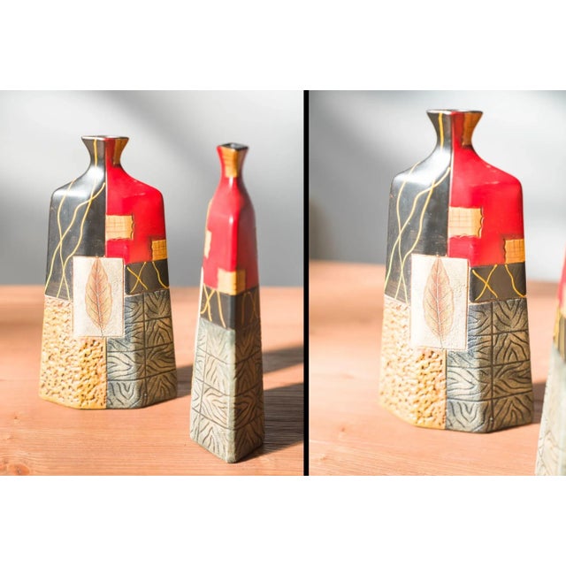 Pair of 1980s-90s Terracotta Vases – Geometric and Textured Design Add a striking touch of retro flair to your décor with...