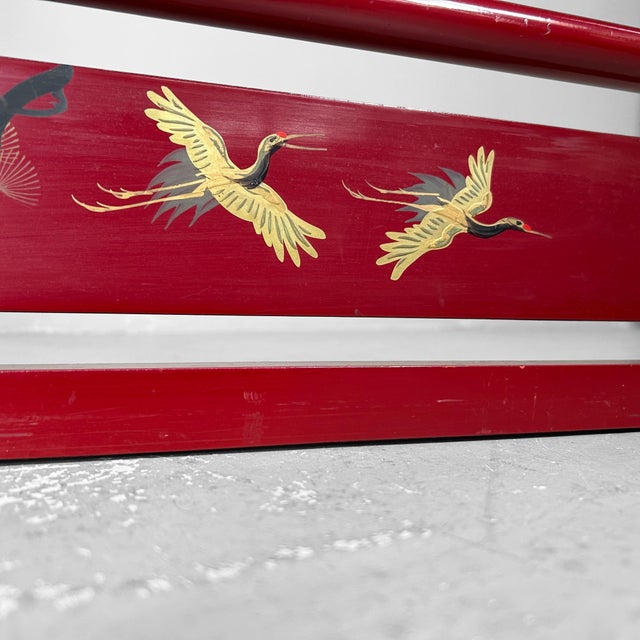 This elegant and practical foldable kimono hanger, crafted from bright red lacquered wood, is a stunning example of...