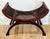 A handsome vintage Roman-inspired curule bench with a graceful, sculptural silhouette. Sweeping X-form legs support a...
