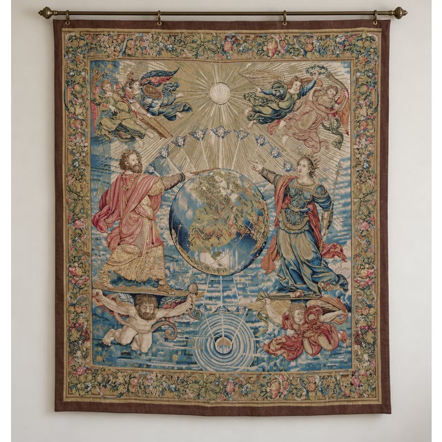 This impressive vintage tapestry presents an elaborate celestial and allegorical scene centered around a large terrestrial...