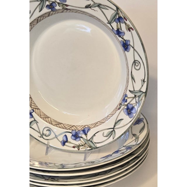 These gorgeous floral bowls with vivid blue sweet- pea-esque flowers. I have other matching pieces of this design listed...
