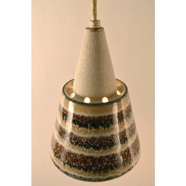 Interesting diminutive ceramic pendant fixture, probably California made, in the Danish Modern style. Textured glaze on...