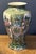 This vintage Japanese vase, adorned with pheasants, flowers, gold trim, and Moriage beading, boasts an extraordinary...