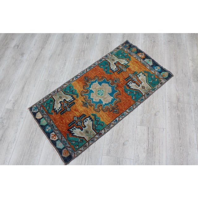 This gorgeous traditional hand knotted Vintage Anatolian rug is approximately 60 years old in excellent vintage...