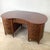The kidney writing desk is one of the most celebrated forms in English furniture history, and this Edwardian example —...
