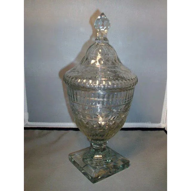 A wonderful George III 18th c. Anglo Irish Crystal Urn and cover fully facet cut. Measures 11.5" tall. Good overall...
