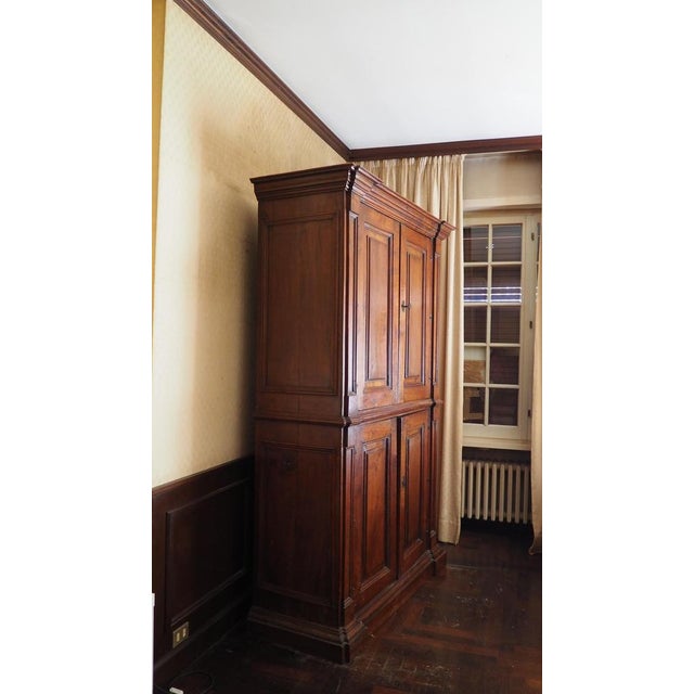 A 17th-century walnut cabinet, entirely original.