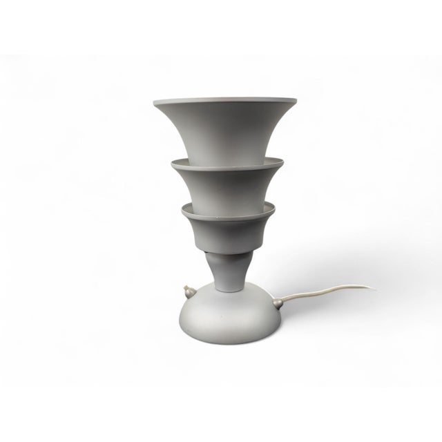 Lamp belonging to the 1989 Hollywood collection, designed by Matteo Thun for Tronconi, Italy. Inspired by the glamorous...